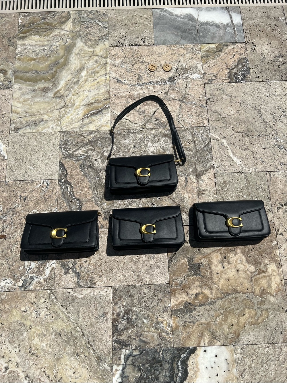 Black womans purse with gold C